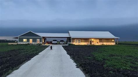 metal barn next to house connected by breezeway|barndominium with breezeway.